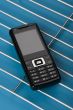 mobile phone on blue close up