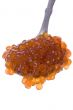 Red caviar on spoon