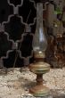 Betty Lamp in the Grilled Window Background