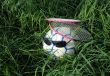 Two Badminton Rackets and Soccer Ball