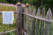 Clay Pots and Towel on the Fence