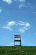 Wooden chair on a hilltop