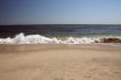 Crashing wave on the beach