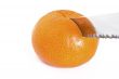 Mandarin orange cut with a knife
