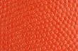 Orange rubber basketball macro background