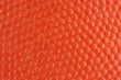 Orange rubber basketball macro background