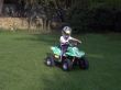 boy riding little quad bike