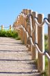 Pathway with wood post fence