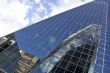 Reflection of buildings on a glass building