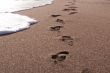 footprints on the beach	