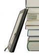 Stack of books and electronic book reader