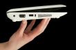 Netbook held by fingers