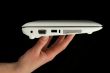 Netbook held by fingers