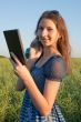 Teen girl with electronic book reader