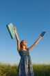 Teen girl with electronic book reader 