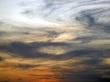 Curved clouds on the sunset