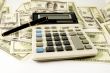 calculator, pen  and paper money