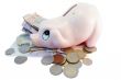 Piggy bank money box with different currency money