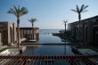 Mediterranean houses and streets. Palm trees.