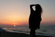 Girl's silhouette on sunset