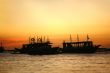 Drifting boat on a sunset