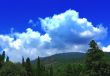 white clouds over the mountains