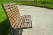 wooden bench in a city park