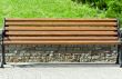wooden bench in a city park