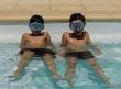 two boys in swimming pool