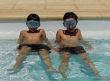 two boys in swimming pool