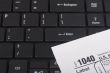 Laptop with a form 1040