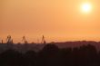Sunrise over the cargo cranes