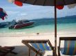 The boat and the sea on the beach