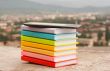 Stack books with electronic book reader