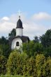 White Chapel Surrounded by Green Trees