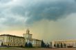 Storm clouds over buildings