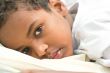 Boy resting in his bed