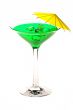 Martini glass with green coctail isolated on white