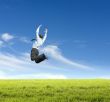man jumping on  meadow