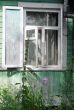 Open Window of Shabby Country House