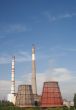 Refinery industrial pipes against blue sky