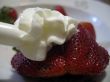 Strawberries and cream on the plate