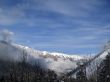 Mountain under the blue sky and the clouds