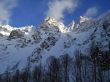 Mountain under the blue sky and the clouds