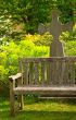 Rustical bench in blossom graveyard