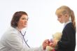 The woman the doctor with the little girl