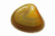 Yellow round stone with curves