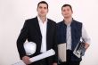 a construction manager and a worker