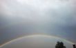 Rainbow rising after rain