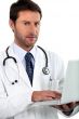 doctor holding laptop